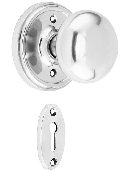 Classic Rosette Mortise Lock Set with Round Brass Knobs in Polished Chrome.